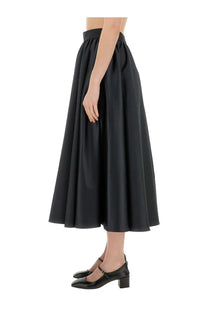 Patou women’s black high-waisted midi skirt with flowing pleated design for elegant casual wear
