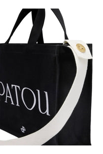 Patou women’s medium black canvas tote bag with white lettering and gold-tone button detail
