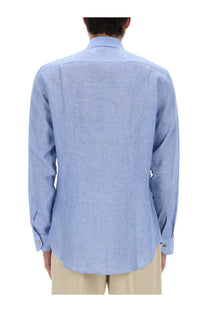 Light blue paul smith men’s linen shirt with subtle textured weave and buttoned cuffs