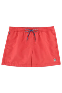Paul Smith men’s bright coral swim trunks with drawstring waistband and subtle logo on the lower right leg