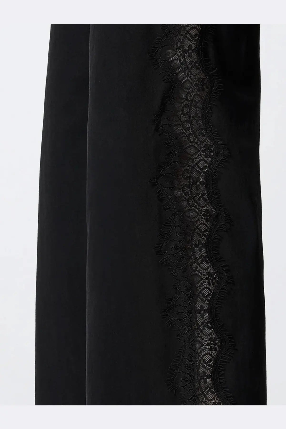 Pinko women’s black velvet skirt with delicate black lace trim down the side styled as denim trousers