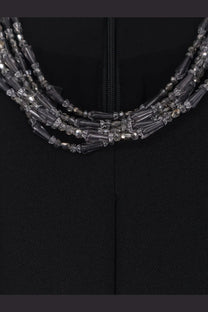 Multi-strand necklace with clear gray crystal beads and metallic accents paired with pinko women’s dragon fruit jumpsuit black