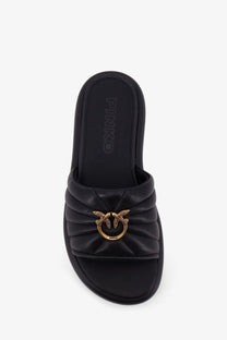 Pinko women’s Fiona low black leather slide sandal with quilted design and gold-tone bird clasp featuring Pinko branding