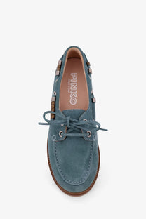 Pinko women’s grace suede loafers blue featuring teal suede boat shoe with brown leather trim and metallic eyelets