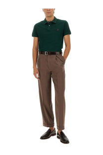 Polo Ralph Lauren men’s cotton polo shirt in dark green with a red embroidered logo on the left chest