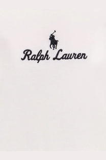 Black embroidered Ralph Lauren polo player logo above brand name on white cotton Polo Ralph Lauren men’s shirt