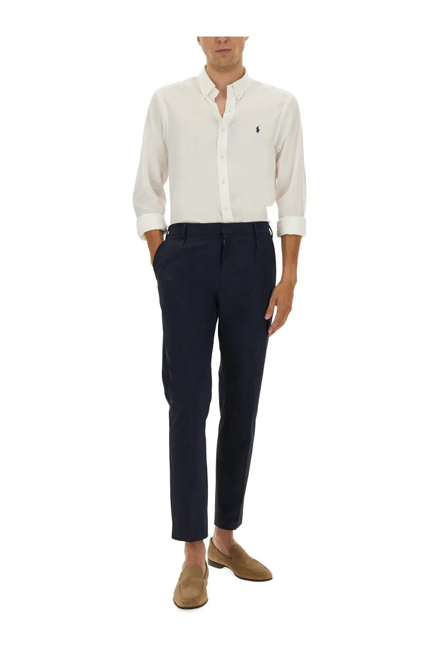 Navy blue tailored cotton trousers with sleek modern cut and subtle creases paired with polo ralph lauren white shirt