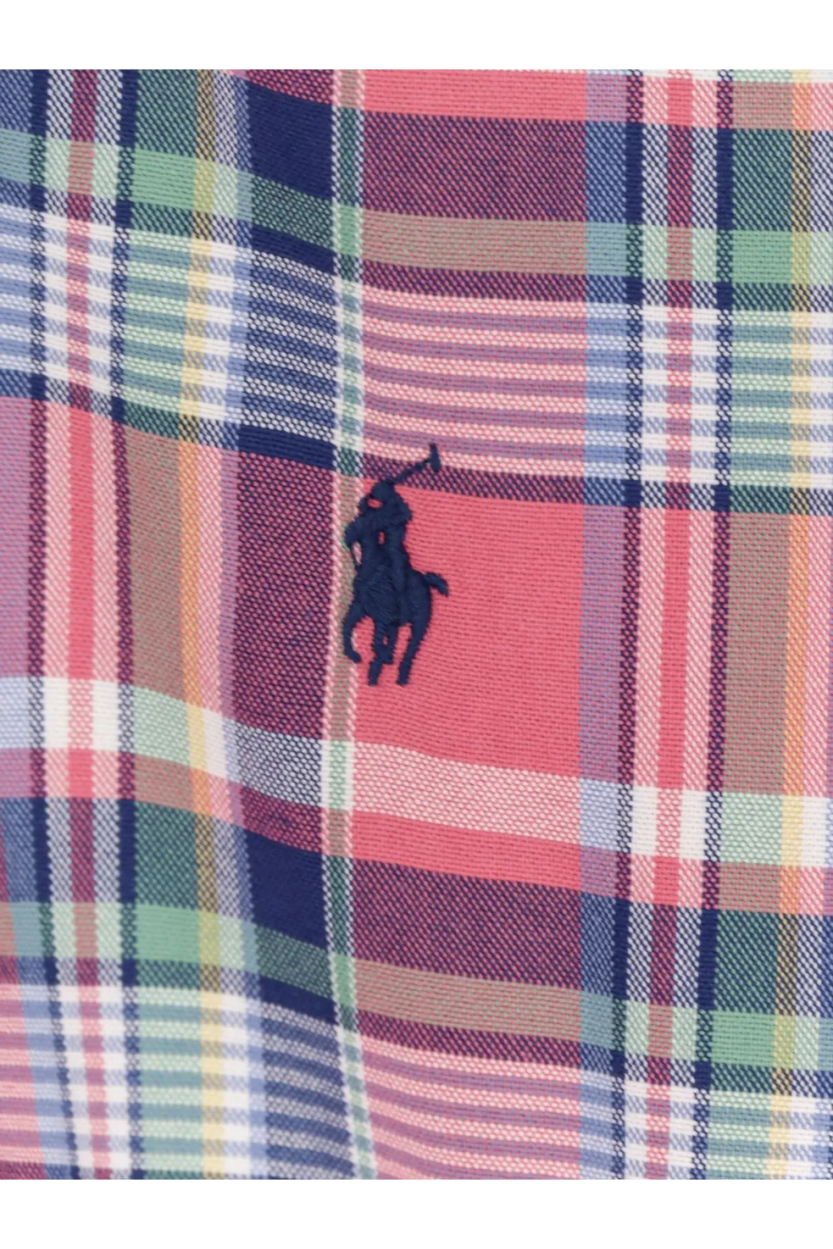 A navy blue embroidered polo player logo on vibrant multicolored plaid fabric of Polo Ralph Lauren men’s custom fit cotton shirt blue