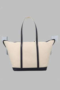 Cream-colored canvas Polo Ralph Lauren women’s borsa tote large with navy blue leather handles and trim in tela pelle beige