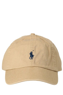 Beige cotton baseball cap featuring a navy blue embroidered polo player logo by Polo Ralph Lauren for women