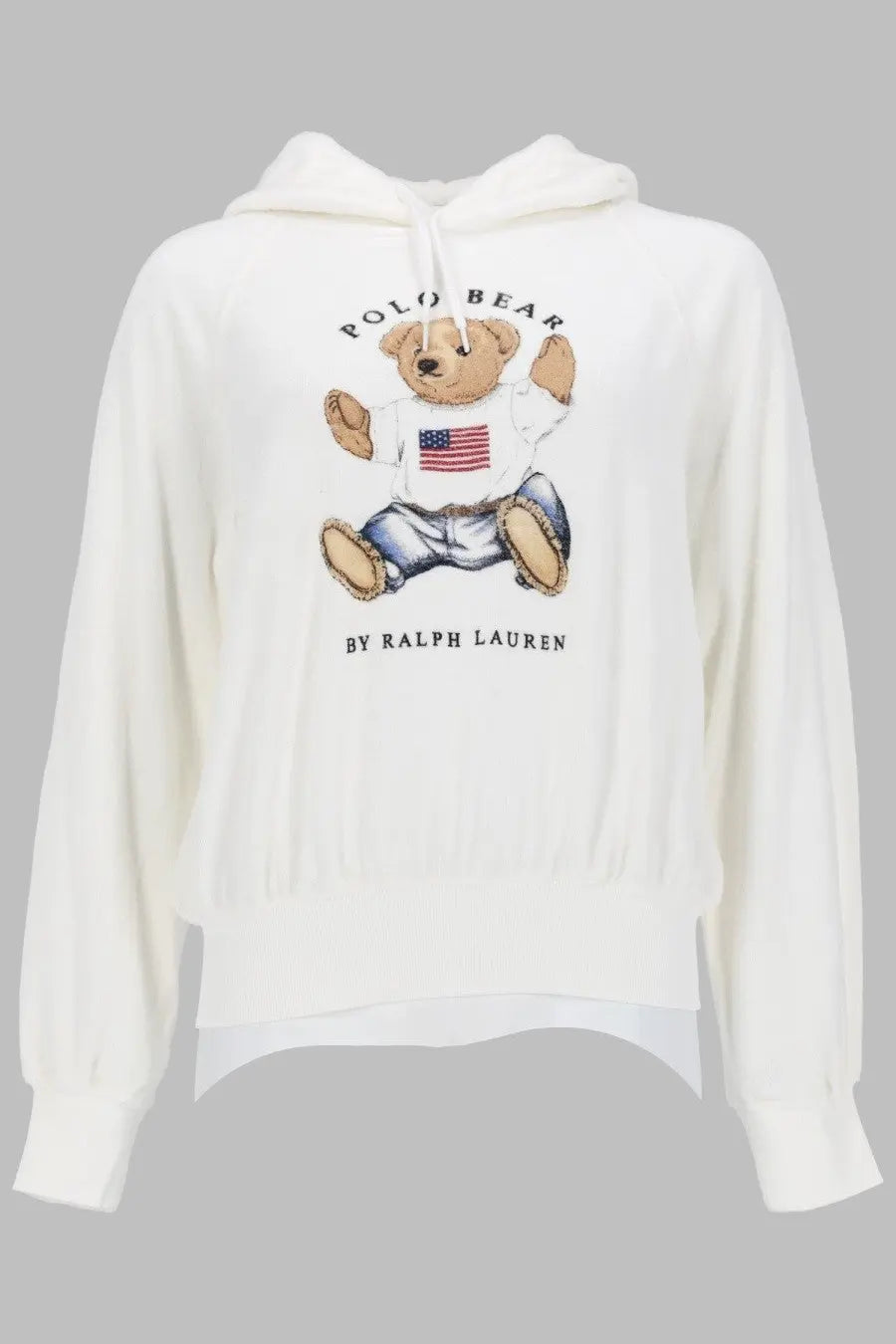 White hooded sweatshirt featuring a cartoon bear with american flag shirt and blue jeans by ralph lauren