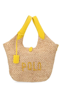 Beige woven straw tote bag with bright yellow leather handles and polo ralph lauren logo embroidery