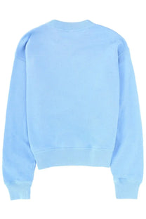 Light blue Polo Ralph Lauren women’s crewneck sweatshirt with ribbed cuffs and hem in soft cotton blend material