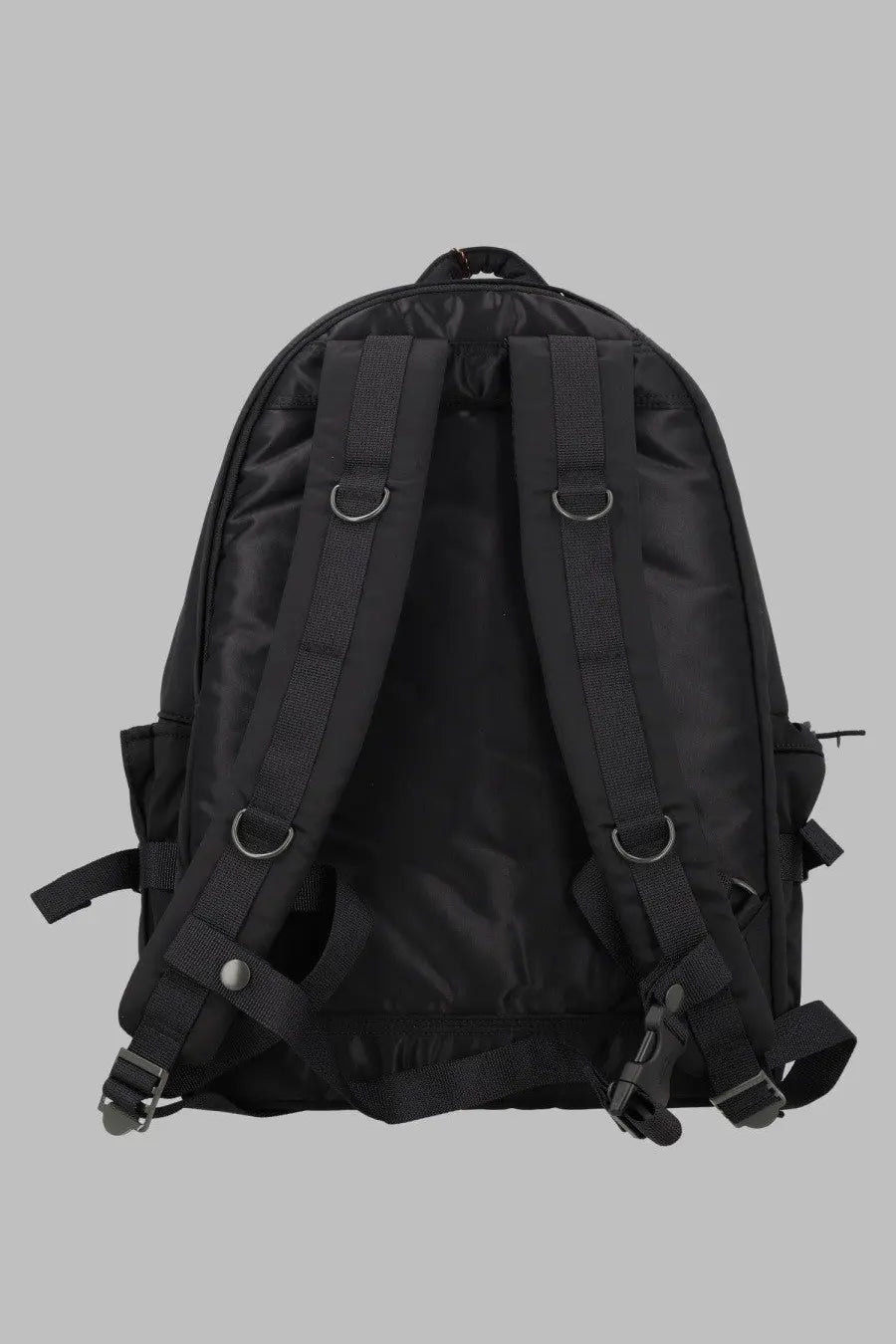 Porter-yoshida &amp; co men’s zaino tanker black nylon backpack with adjustable shoulder straps and metal d-rings back view