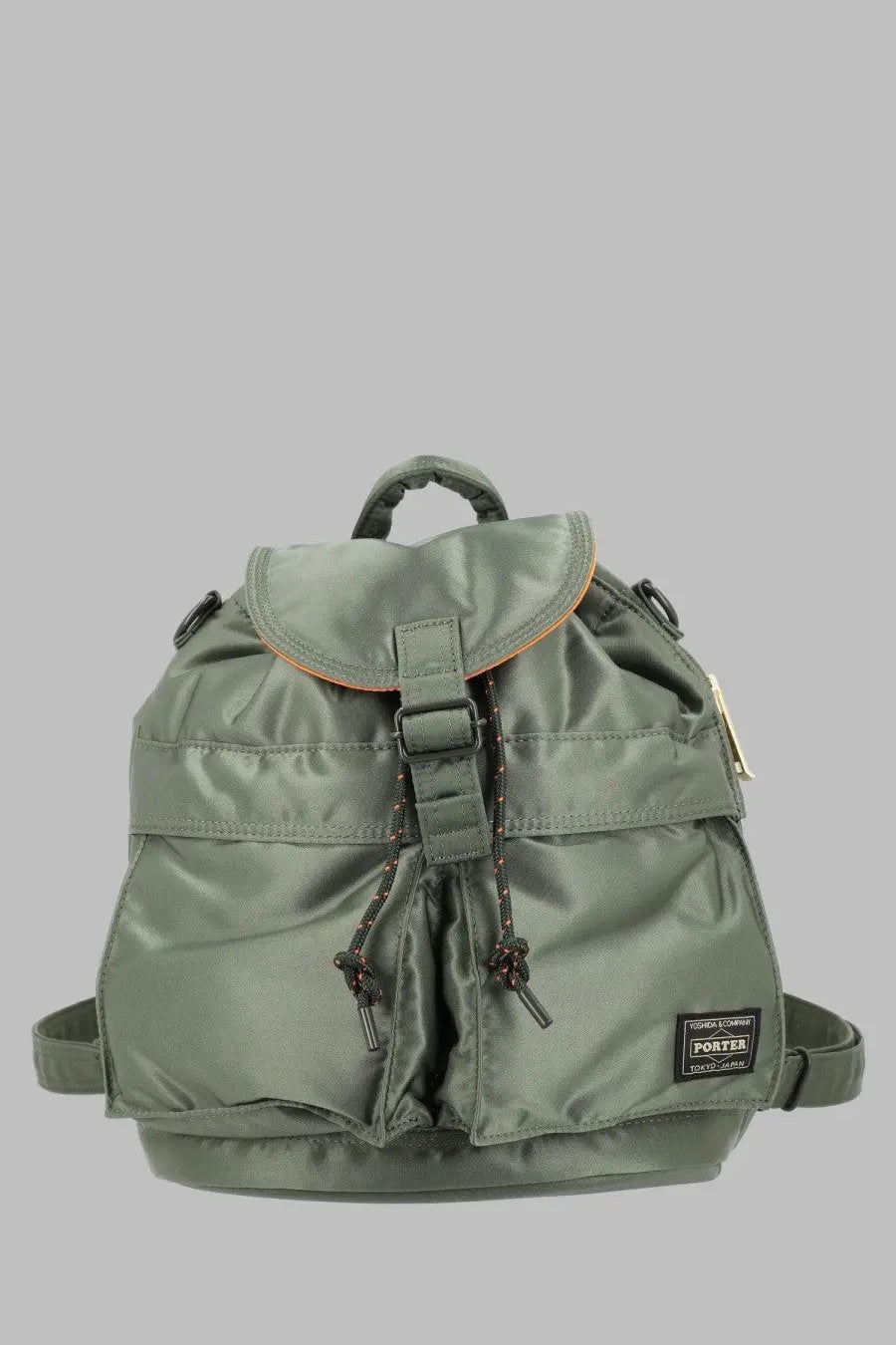 Porter-Yoshida &amp; Co men’s zaino tanker green olive green nylon backpack with orange-trimmed flap and black drawstrings