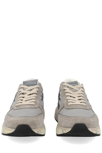 Premiata men’s sneaker Mick grey features gray suede and mesh with a chunky sole and brand name on the tongue