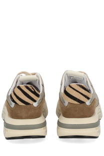 Premiata women’s cassie sneaker in tan suede and mesh with black and tan zebra print heel tab and layered cream gray soles