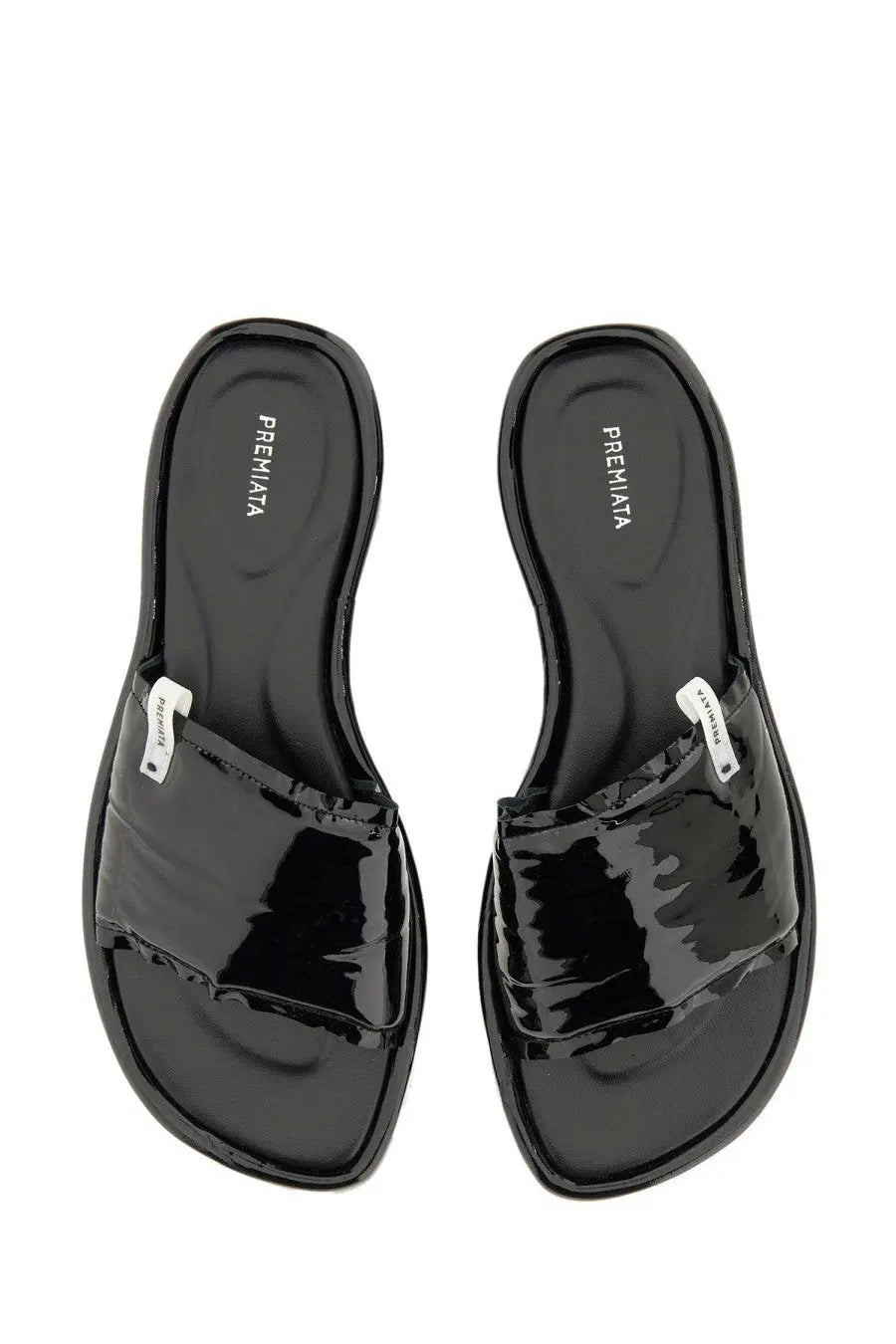 Premiata women’s slide sandal black made of glossy patent leather with a sleek minimalist design
