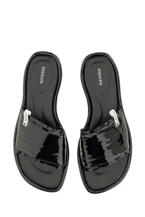 Premiata women’s slide sandal black made of glossy patent leather with a sleek minimalist design