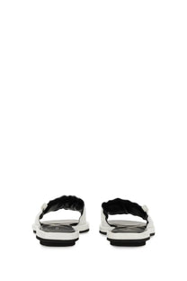 Premiata women’s slide sandal in white and black leather with a ruched strap design for casual wear
