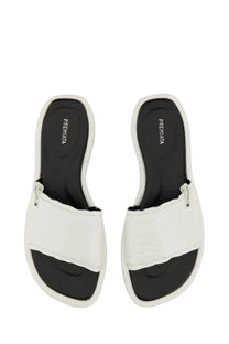 Premiata women’s slide sandal in white and black with a sleek minimalist design and comfortable slide style