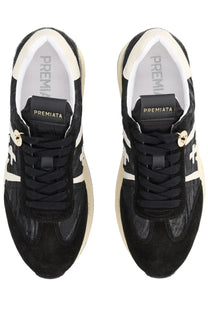 Premiata women’s sneaker Beth blue in black and white with textured suede uppers gold-tone eyelets and chunky rubber sole