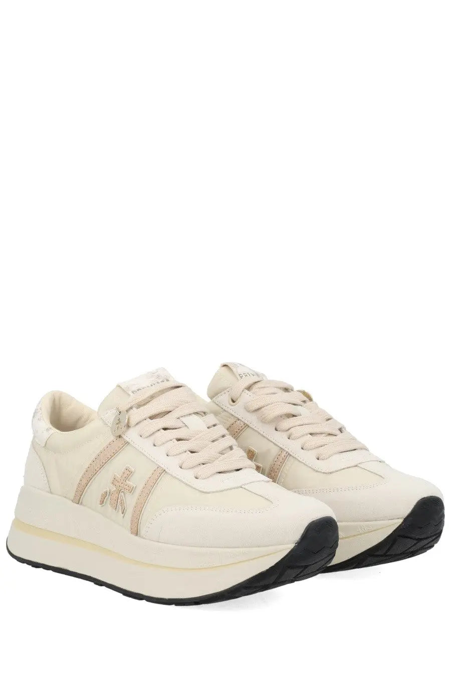 Premiata women’s sneaker bethcoin white cream-colored platform sneaker with subtle metallic logo and black rubber soles