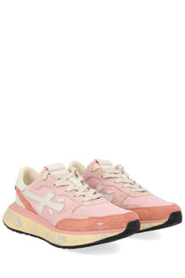 Premiata women’s sneaker lauryn blue in pink and peach with white logo accents and a yellowish sole