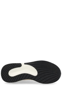 Black and white rubber sole with textured tread pattern of premiata women’s sneaker moerund beige
