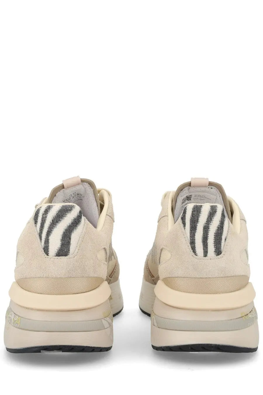 Back side of premiata women’s sneaker moerund beige cream suede with black and white zebra patch on heel