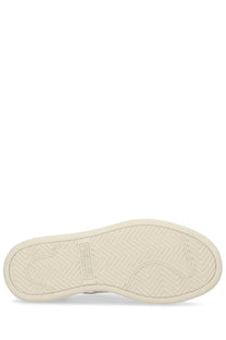 Premiata women’s sneaker quinnd white with cream-colored rubber sole featuring herringbone tread and premium branding