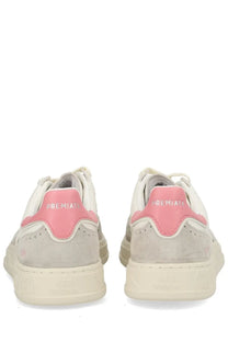 Premiata women’s sneaker Quinnd white with white and pink suede upper, stitched detailing, and chunky off-white sole