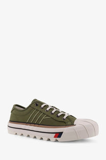 Pro-Keds men’s royal intrepid canvas sneakers in olive green with white laces, rubber toe cap, and red blue stripe sole