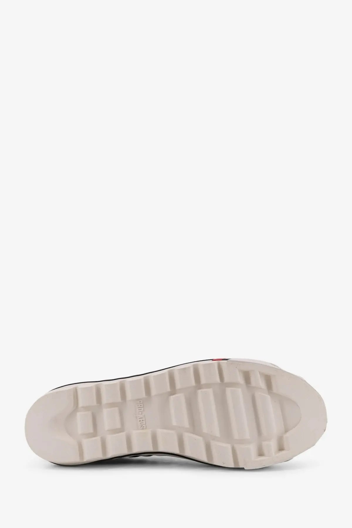White rubber sole with textured blocky tread and subtle red accent on pro-keds men’s royal intrepid canvas sneakers green