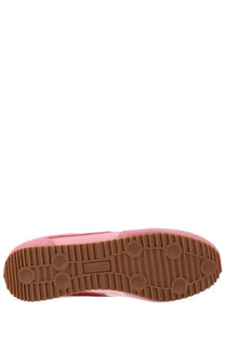 Pro-keds women’s reacer sneaker in pink with brown rubber sole and classic tread pattern shown from the back