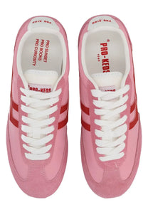 Pink suede pro-keds women’s sneaker with red stripes and white laces in the pro-keds women’s reacer sneaker blue product line