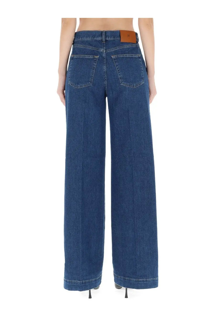 Dark blue wide-leg denim trousers with brown leather pt torino brand patch at waistband women’s jeans poppy blue