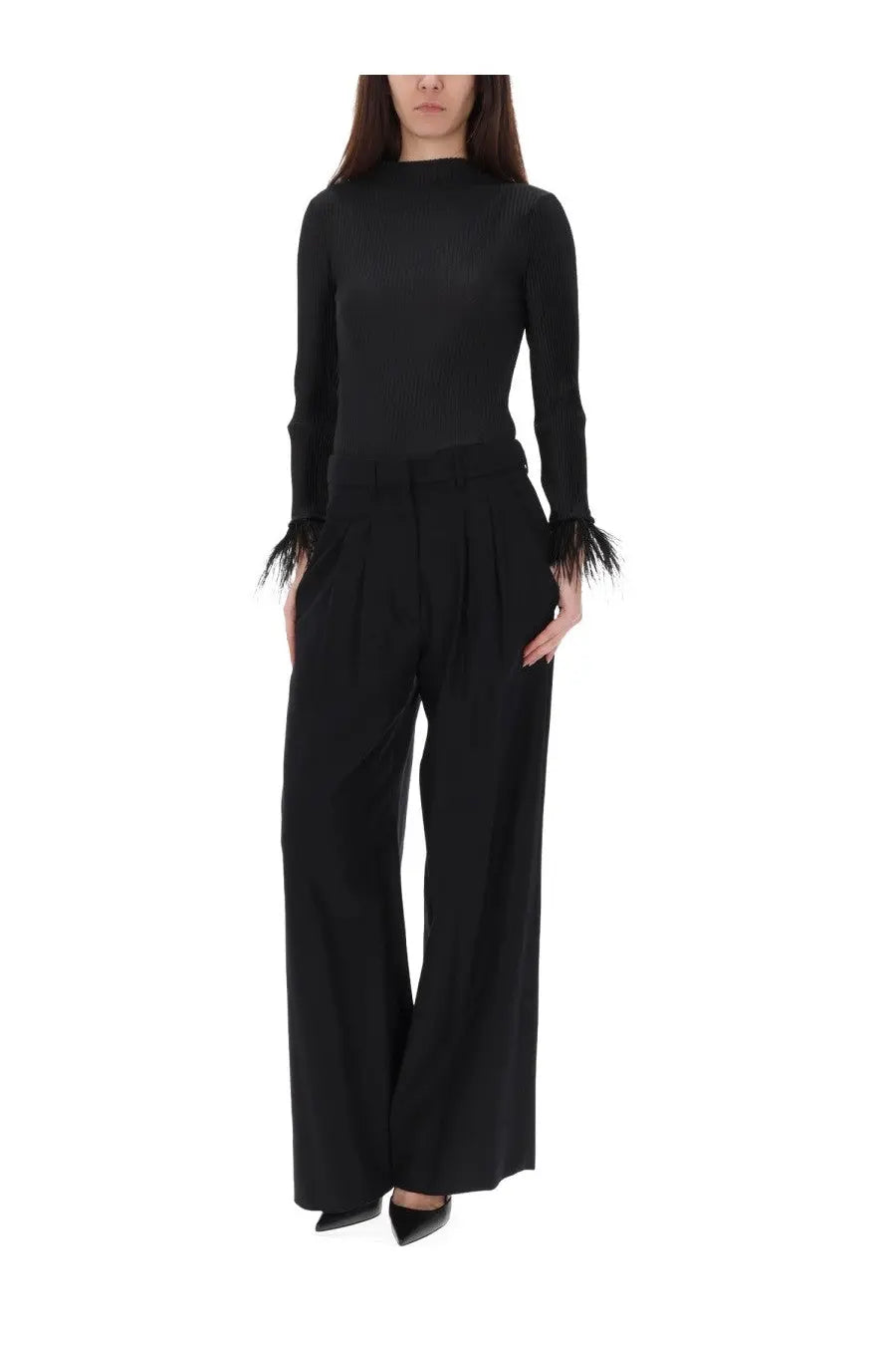 Black high-neck knit top with feathered cuffs paired with pt torino women’s pants frankie black wide-leg trousers