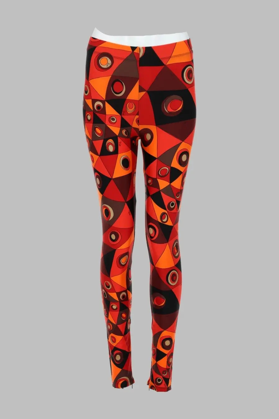 Pucci women’s leggings con stampa orange featuring vibrant red and orange geometric patterns with bold black designs