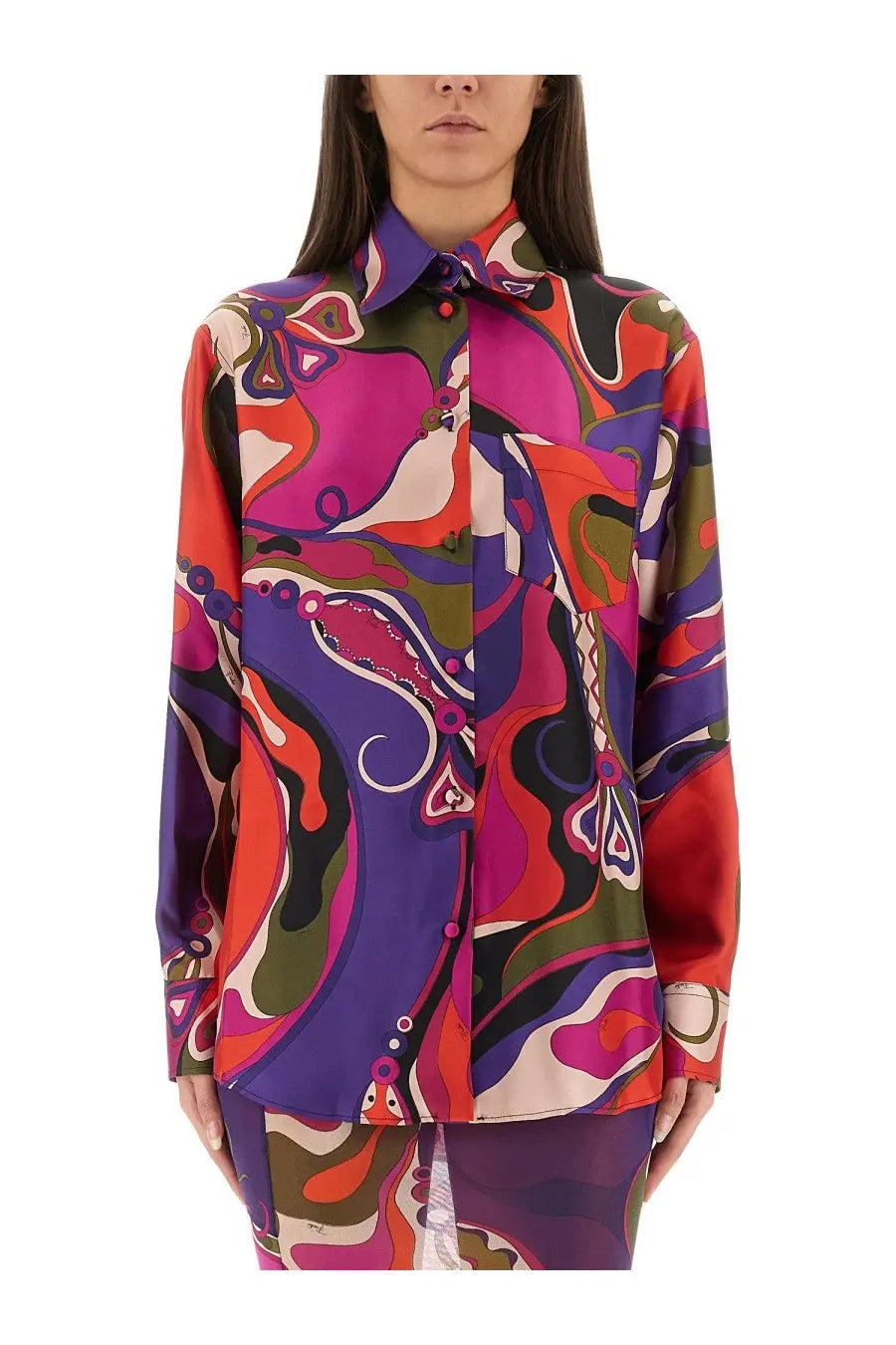 Vibrant long-sleeved silk blouse with psychedelic swirl pattern in bold pinks purples reds and greens by Pucci