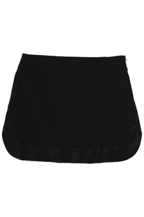 Pucci women’s black wool miniskirt with sleek form-fitting design and subtle ruffled hem