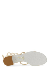 Gold-toned strappy rene caovilla women’s sandal with glitter finish and decorative bow on the heel back view