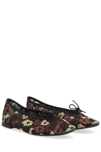 Repetto women’s dancer lilouh black ballet flats with vibrant red and gold floral pattern lace trim and bow at the toe