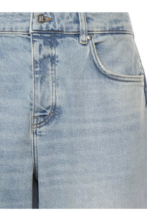 Represent men’s boot cut jeans in light-wash denim with a faded distressed look and visible stitching details