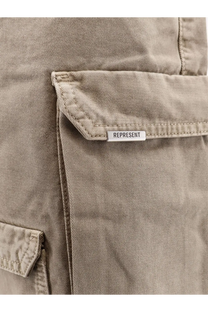 Beige represent men’s cotton cargo bermuda shorts with subtle textured fabric and white brand tag on pocket flap