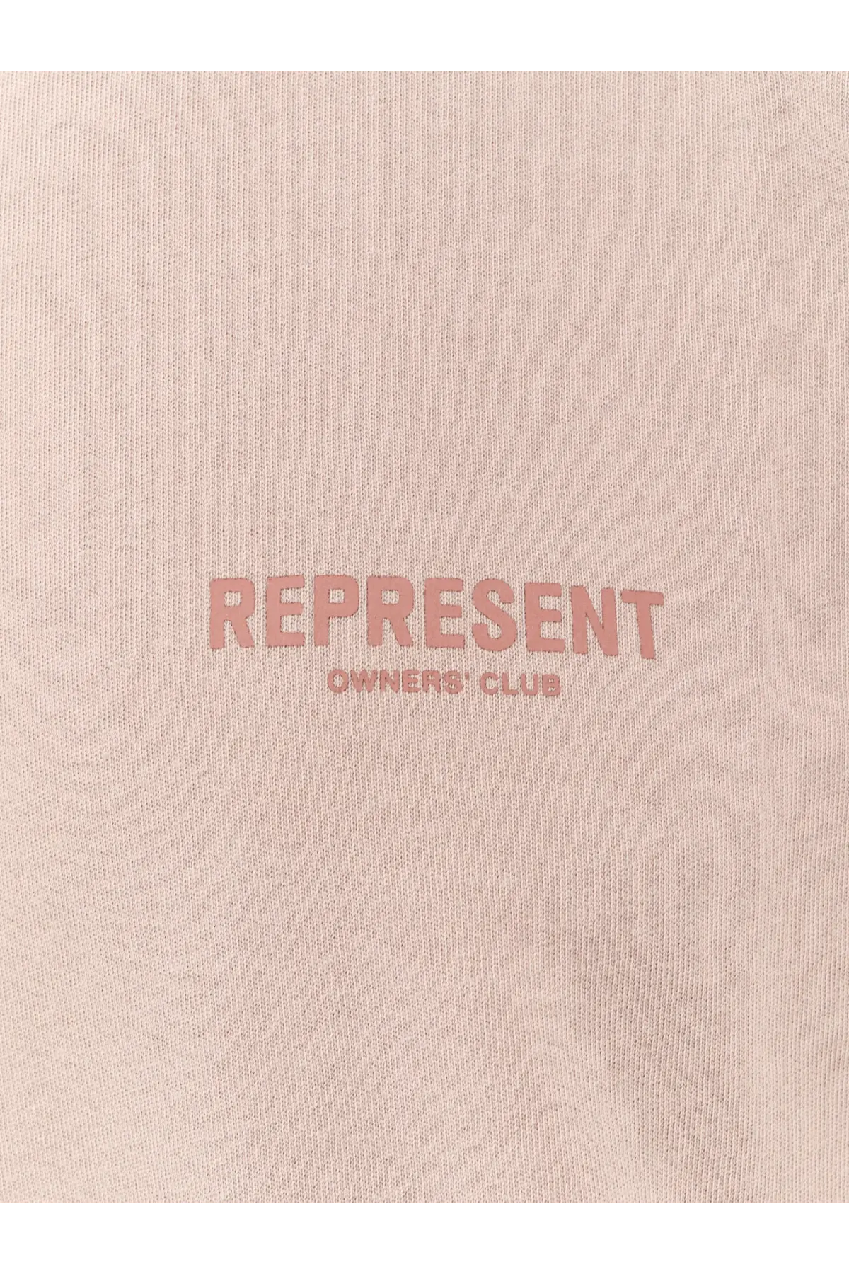 Represent men’s cotton shirt grey featuring a soft blush pink fabric with a subtle rose-colored logo across the chest