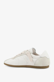 Represent men’s leather and suede sneakers in white with tan rubber sole low-top design