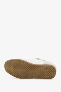 Represent men’s white leather and suede sneaker with tan rubber sole and diamond tread pattern