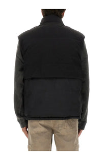 Back side of represent men’s black padded vest with contrasting dark gray sleeves and subtle lower back logo