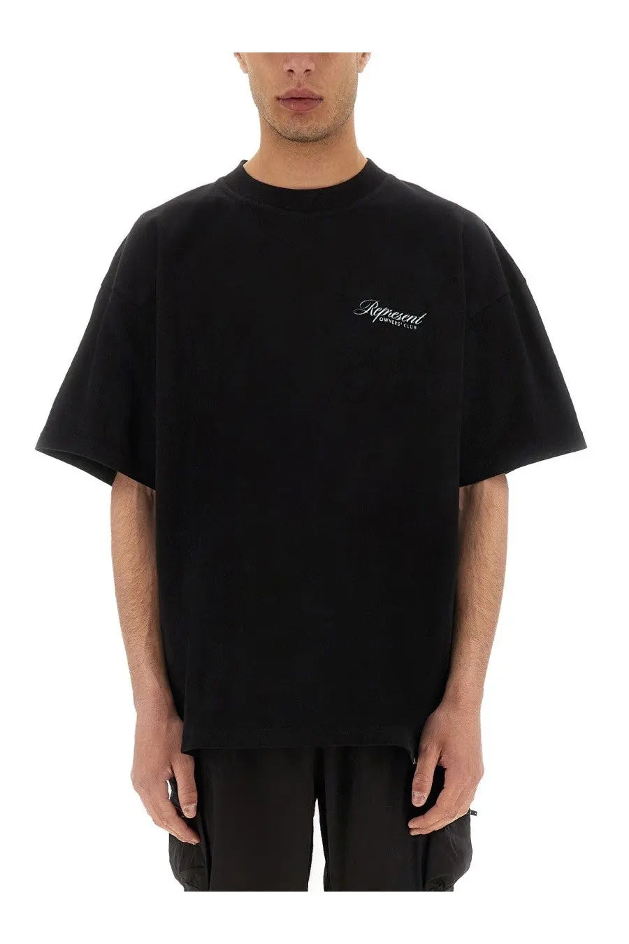 Black oversized t-shirt with subtle white embroidered logo on left chest from represent owners club script collection